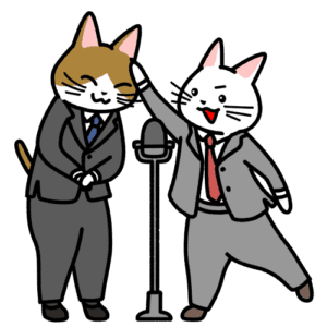 漫才をする猫のイラスト